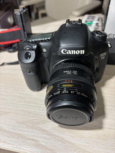 Canon 35 70 - +,